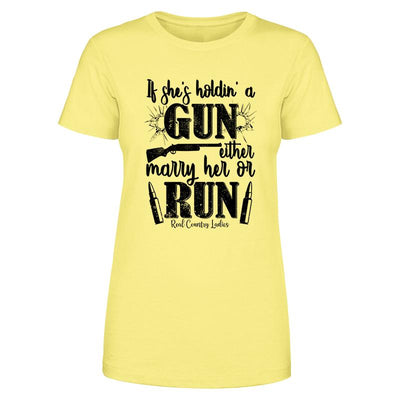 Blowout |  If She's Holdin' A Gun Black Print Front Apparel