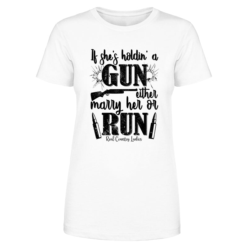 Blowout |  If She's Holdin' A Gun Black Print Front Apparel