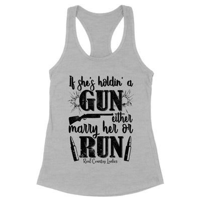 Blowout |  If She's Holdin' A Gun Black Print Front Apparel