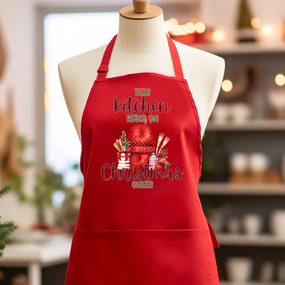 Coming Soon |  This Kitchen Runs On Christmas Cheer Apron