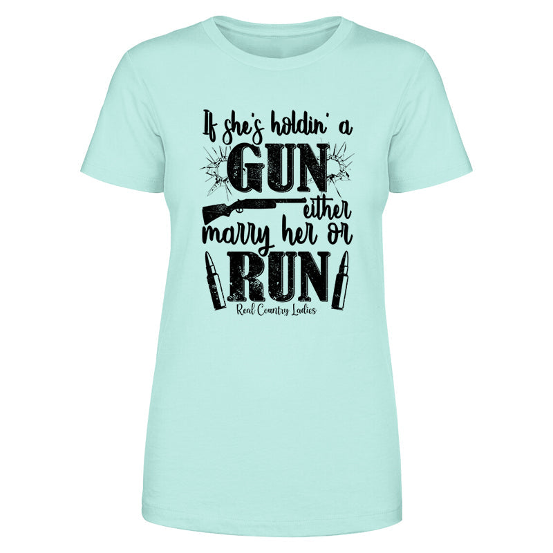 Blowout |  If She's Holdin' A Gun Black Print Front Apparel