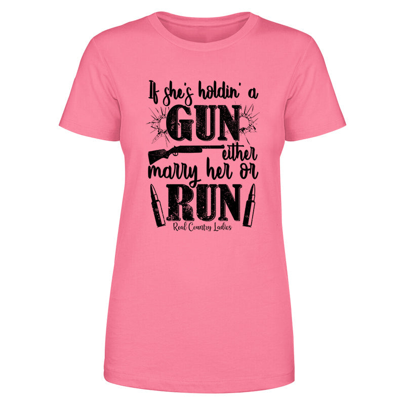 Blowout |  If She's Holdin' A Gun Black Print Front Apparel