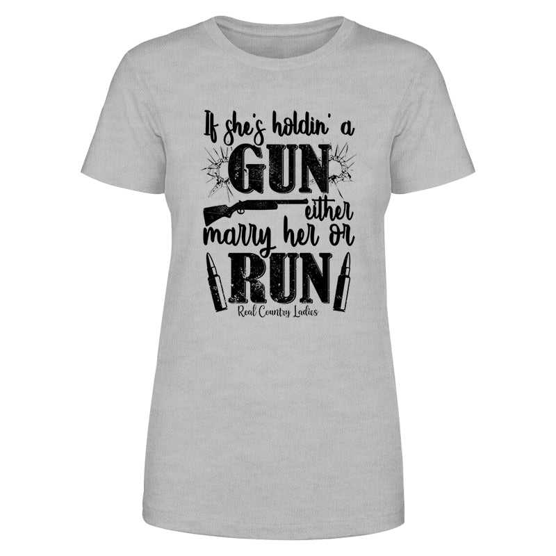 Blowout |  If She's Holdin' A Gun Black Print Front Apparel