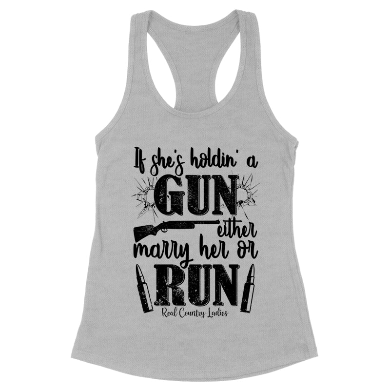 If She's Holdin' A Gun Black Print Front Apparel